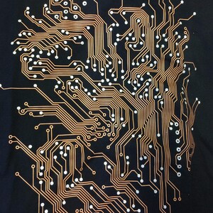 Black shirt with a circuit board image screen printed onto it.