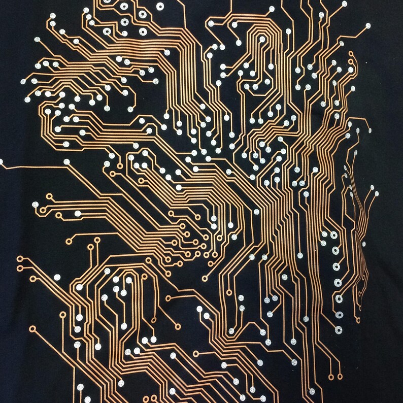 Black shirt with a circuit board image screen printed onto it.