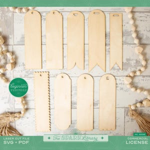 May include: A collection of unfinished wooden bookmarks in various shapes, including rectangular, scalloped, and banner designs. The bookmarks are made of light-colored wood and are ready for customization. The image also includes the text "beginner friendly" and "The Spark Library".