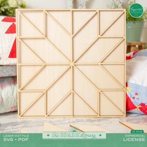 May include: A wooden laser cut design with a geometric pattern. The design features a series of interconnected triangles and squares, creating a starburst effect. The text "The Spark Library" is visible at the bottom. The design is suitable for crafts and home decor.