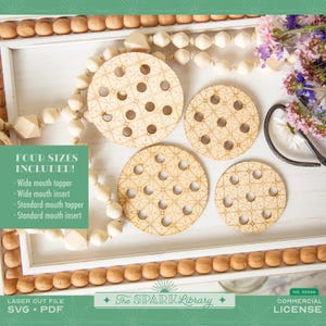 May include: Four laser-cut wooden toppers and inserts in various sizes, featuring a floral pattern with circular cutouts. The image includes text that says "FOUR SIZES INCLUDED!" and "The Spark Library".