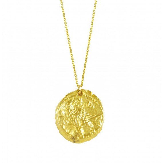 old coin pendant