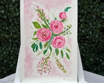 Bouquet di ranuncoli rosa