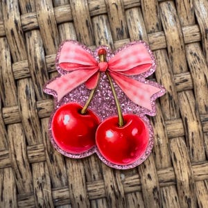 May include: A handmade wooden sign with the text "Welcome" in a playful font. The sign features a distressed white background and a dark brown border. A small, decorative heart is attached to the bottom.