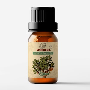 May include: A brown glass bottle of Myrrh Oil with a black cap. The label features the text "MYRRH OIL 100% Pure Essence Oil" and a botanical illustration. The bottle contains 10 ml of oil.
