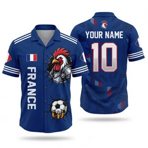 May include: Two blue button-down shirts with a French theme. One shirt features a rooster graphic, the French flag, and the word "FRANCE." The other shirt has the number 10, the text "YOUR NAME," and a rooster logo on the back.
