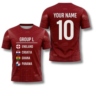 May include: Maroon soccer jersey with the text "GROUP L" and the flags of England, Croatia, Ghana, and Panama. The back of the jersey displays the number "10" and the text "YOUR NAME" in white. The year "2026" is printed on the front and back.