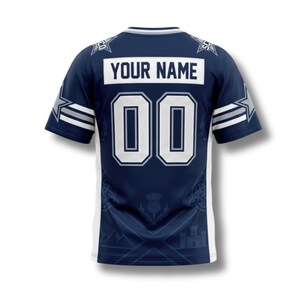 May include: A white ceramic mug with a black handle and the text "But First, Coffee" in a black, handwritten-style font. The mug is on a white surface.