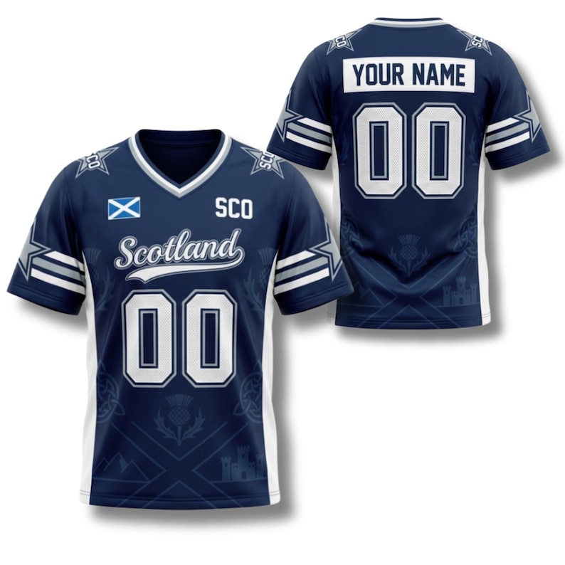 May include: Navy blue Scotland jersey with white accents. Features the Scotland flag, the word "Scotland", and the number "00". The back of the jersey has the text "YOUR NAME" above the number "00".