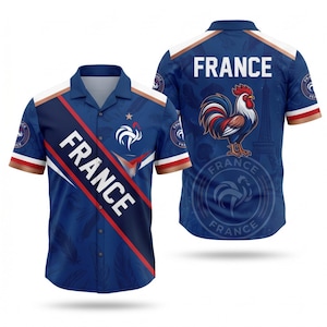 May include: Blue button-up shirt with the word "FRANCE" in white. The shirt features a rooster graphic and the French flag colors. The back of the shirt has the word "FRANCE" and a rooster graphic.