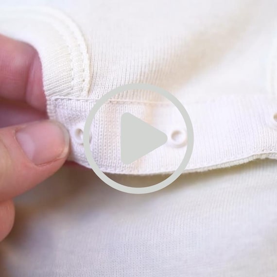 Rabbit Skins 4400 Natura Infant Baby Rib Bodysuit Fabric Details Texture Video, Real Product Video | Video Mockup | No AI