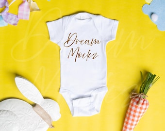 Easter Baby Onesie Mockup | Rabbit Skins 4400 White Baby Bodysuit Mockup | 4400 White Flatlay Spring Mock-up | Real Product Mock