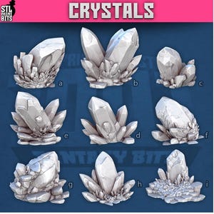 May include: A collection of nine 3D-printed crystal models in various shapes and sizes. The crystals are light gray and have a faceted appearance, with a rocky base. The word "CRYSTALS" is displayed in a pink banner at the top of the image.