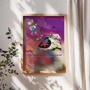 May include: A framed poster featuring the album art for Kanye West's "Graduation." The artwork depicts a cartoon bear in a jacket and sneakers floating in a purple sky above a spaceship-like structure. The poster includes the album title, artist name, and tracklist.