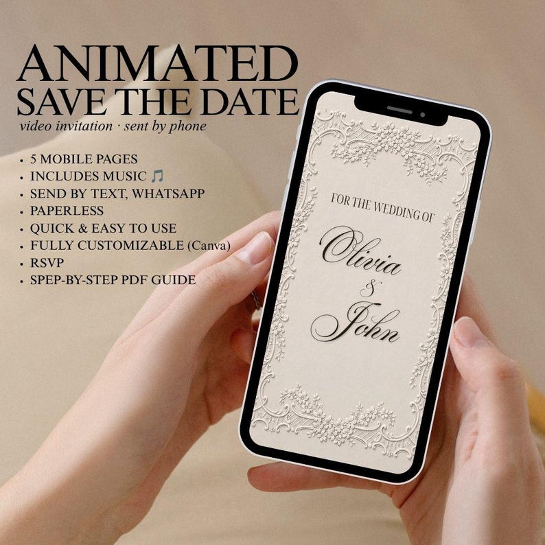 May include: A smartphone displaying a digital wedding invitation with a cream-coloured background and an ornate white lace border. The screen features the text FOR THE WEDDING OF Olivia & John in a black serif font. The design is elegant and formal.
