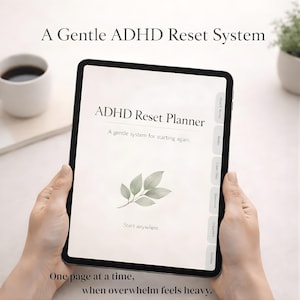 May include: A tablet displaying the "ADHD Reset Planner" with text and a leaf illustration. The screen reads "A gentle system for starting again." Additional text includes "Start anywhere" and "One page at a time, when overwhelm feels heavy."