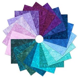 May include: A collection of 20 fabric squares in various shades of blue, teal, purple, and pink. The fabric has a marbled or tie-dye effect.