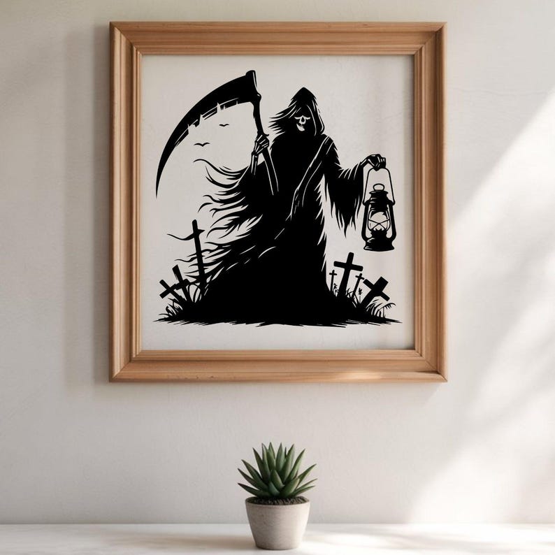May include: Framed black and white artwork featuring the Grim Reaper holding a scythe and lantern in a graveyard scene. The artwork is in a light brown wooden frame, suitable for Halloween decor.