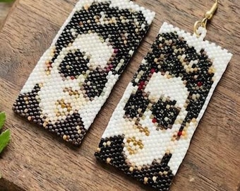 Pendientes de abanico con intrincados detalles en homenaje al rey del rock “ELVIS”