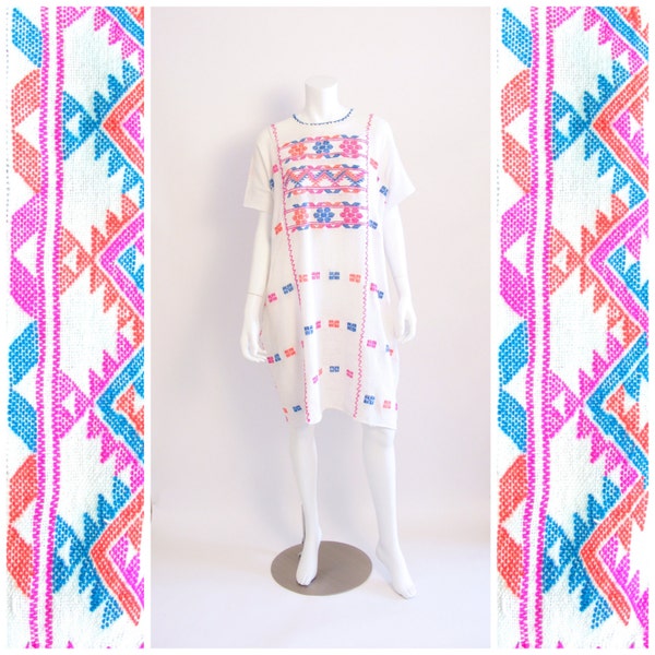 Vintage Mexican hand embroidered woven cotton huipil dress. White, pink, blue, orange. One size fits all.