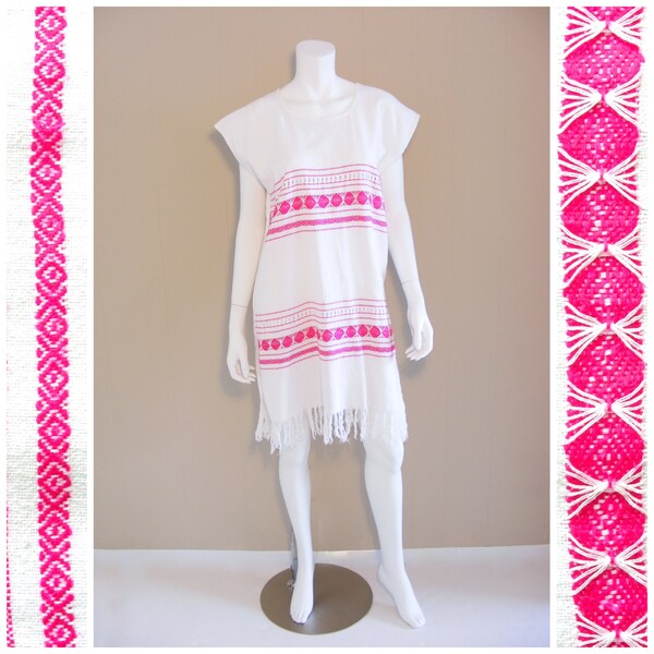 Vintage Guatemalan handwoven dress with pink hand embroidered traditional design and fringe.