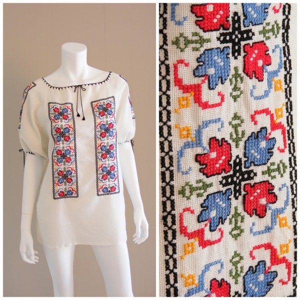 Vintage Hand Embroidered ethnic blouse 1960s. Folk floral embroidery, puff sleeve, fringe tie tassels, white cotton.