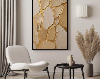 May include: Abstract wall art with a black frame. The artwork features a textured design with beige and gold tones, creating a modern and elegant aesthetic. The room also includes a beige chair, a black side table, and decorative plants.