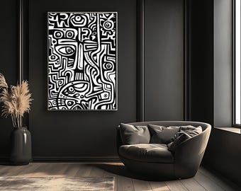 May include: A black and white abstract art print with a face-like design hangs on a dark wall. The artwork features bold lines and shapes, creating a striking visual contrast. The room includes a gray armchair, a vase with dried plants, and a wooden floor.