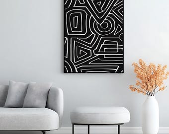Puede incluir: Impresión artística abstracta en blanco y negro con formas geométricas. La obra de arte tiene un diseño audaz con líneas blancas sobre un fondo negro. Las formas incluyen triángulos, rectángulos y círculos, creando una estética moderna. La impresión se muestra en una pared.