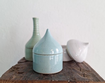 Small handmade ceramic jar.