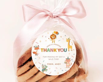 May include: A clear cellophane bag tied with a pink ribbon, filled with cookies. A round sticker on the bag reads "THANK YOU" with colorful animal illustrations and the text "Here's a Roaring Wild Time!" and "From, Andy."