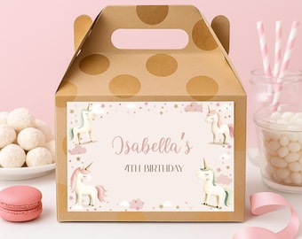 May include: A brown party favor box with a handle and large polka dots. The box features a label with unicorns, clouds, stars, and the text "Isabella's 4th Birthday". Pink and white accents complete the design.