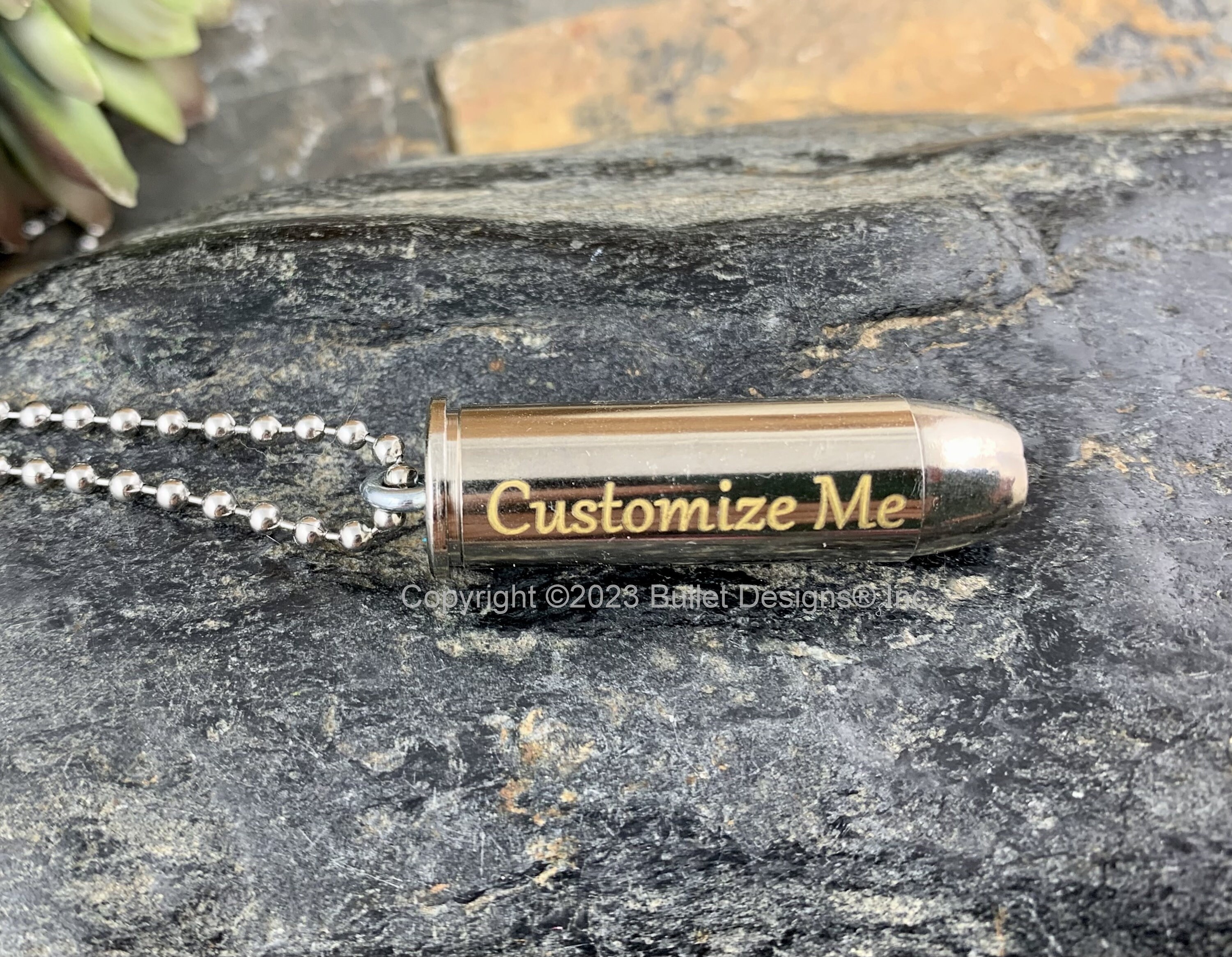Black Bullet cremation urn necklace, cylinder keepsake jewelry in trendy  designs and colors.