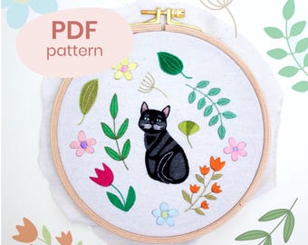Bloemen borduurpatroon zwarte kat (pdf)