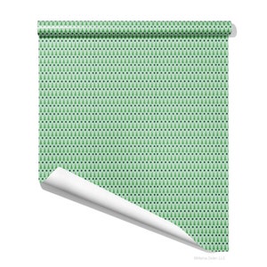 Christmas gift wrap sheet featuring green, modern geometric design by Marisa Dolan