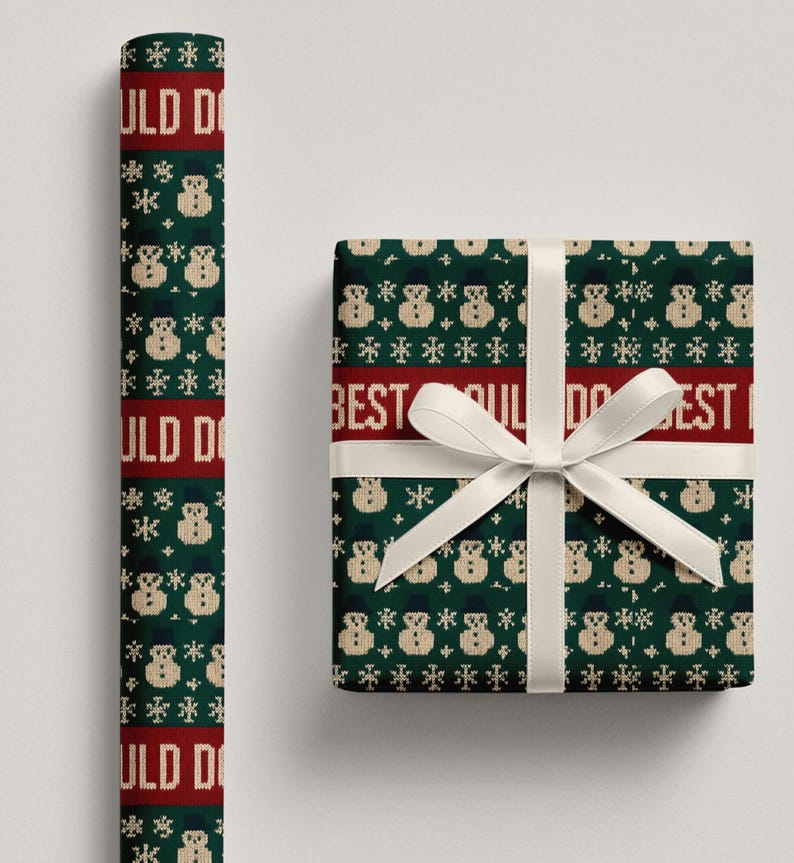 May include: A roll of wrapping paper and a wrapped gift box. Both feature a green background with a repeating pattern of snowmen and snowflakes. The paper has the text "ULD DO" in red. The gift box has a white ribbon and the text "BEST ULD DO BEST".