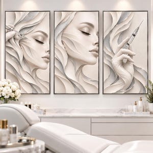 May include: A triptych wall art set featuring three panels with cream and silver abstract flowing lines. The outer panels depict a gloved hand holding a medical syringe near a profile of a face with closed eyes, while the center panel shows a face.