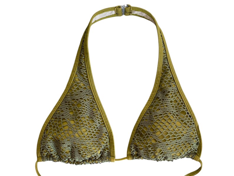 May include: A green halter-style bikini top with a mesh design. The top has adjustable straps and a clasp closure in the back.