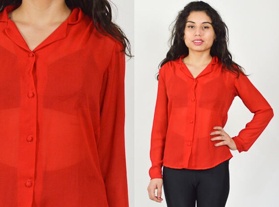 red sheer blouse