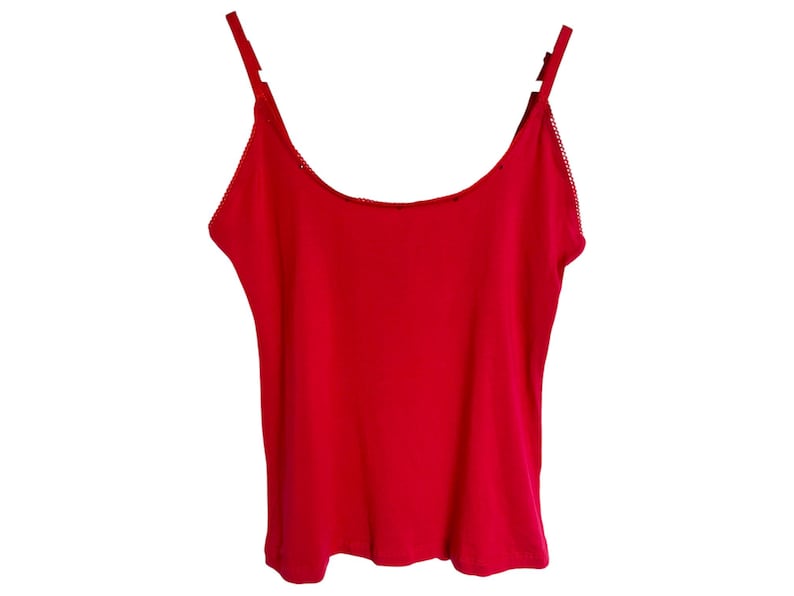 May include: A bright red sleeveless tank top with a scoop neck.