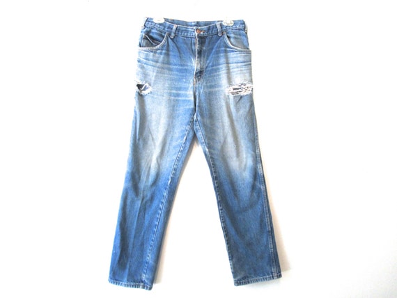 jeans with m on back pocket