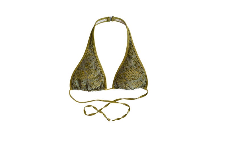 May include: A gold halter-style bikini top with a snakeskin pattern.