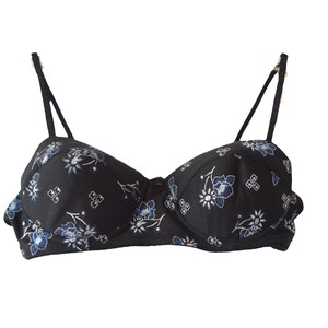 May include: A black bra with a floral pattern in blue and white. The bra has adjustable straps and a hook and eye closure at the back.
