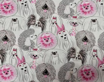 May include: White fabric with a repeating pattern of dog illustrations in black and white, with pink accents. The dogs, including poodles and shih tzus, are depicted in a whimsical style, some with pink bows. The design is playful and decorative.