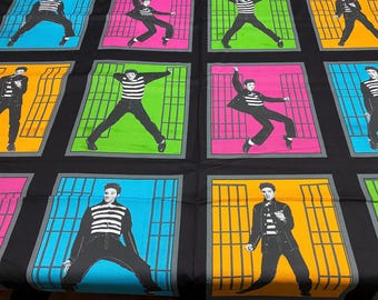 May include: A black fabric featuring a repeating grid pattern of rectangular panels. Each panel displays a graphic illustration of a person in a striped shirt and dark clothing, posed against vibrant backgrounds of pink, green, blue, or yellow.