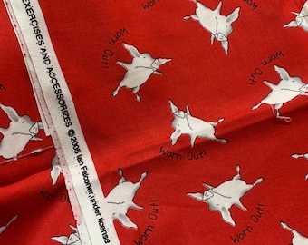 May include: A red fabric featuring a repeating pattern of white pigs in various positions with the text "Worn Out!" printed in black. The white selvage edge includes the text "OLIVIA EXERCISES AND ACCESSORIZES ©2005 Ian Falconer, under license to Andover Fabrics Inc."