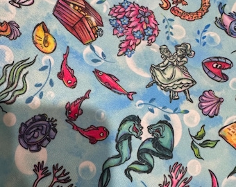 May include: Pale blue fabric featuring a repeating pattern of cartoon sea creatures, including fish, seahorses, and eels. The design also features seashells, coral, and a treasure chest. White bubbles and a dancing couple are also present.