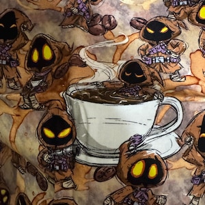 May include: Fabric featuring a repeating pattern of cartoon-like figures with black faces and glowing yellow eyes, wearing brown hooded robes. The figures are interspersed with coffee beans and a white coffee cup filled with dark liquid.