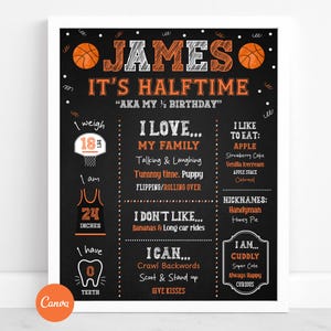 May include: A black chalkboard-style sign with orange basketballs and text. The sign says "JAMES IT'S HALFTIME" and includes personal details like weight, height (24 inches), and favorite things. The sign is framed in white.