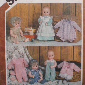 May include: Simplicity sewing pattern number 5615 for making doll clothes. The pattern includes instructions for making a variety of outfits for a 15-16 inch doll, including a dress, a jumper, a pair of pajamas, and a jacket.